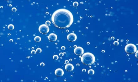 What is the relationship between defoamers and surfactants?